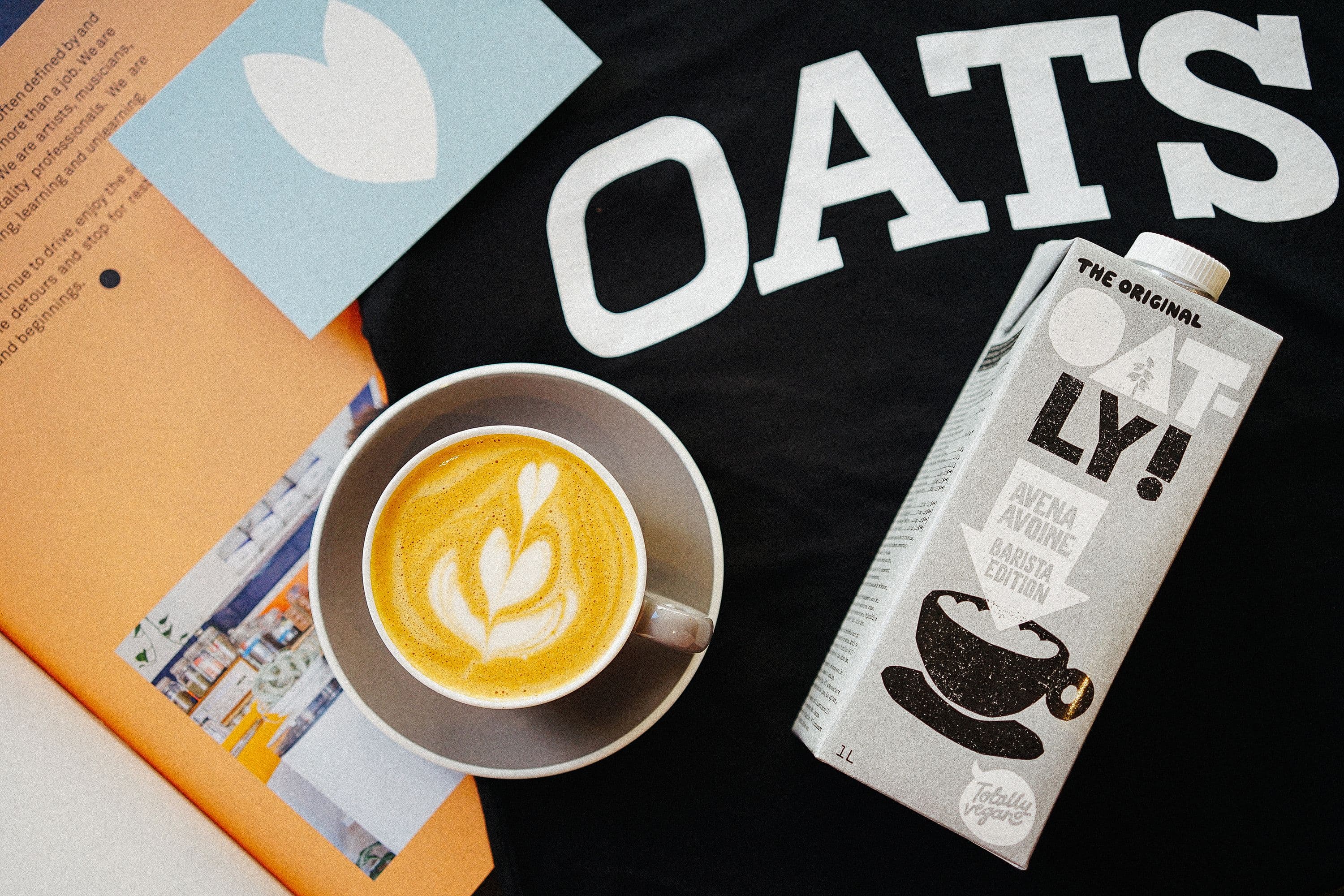 Cappuccino with oat milk, flatlay
